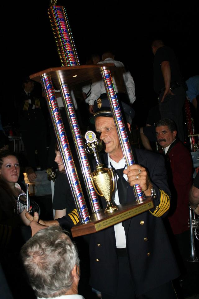 DCVFA County Convention Parade Hopewell Junction, NY - 

Pawling FD Department President Dennis Brunow receiving our Trophy for Best Non-Regulation Uniform - 

August 10, 2012